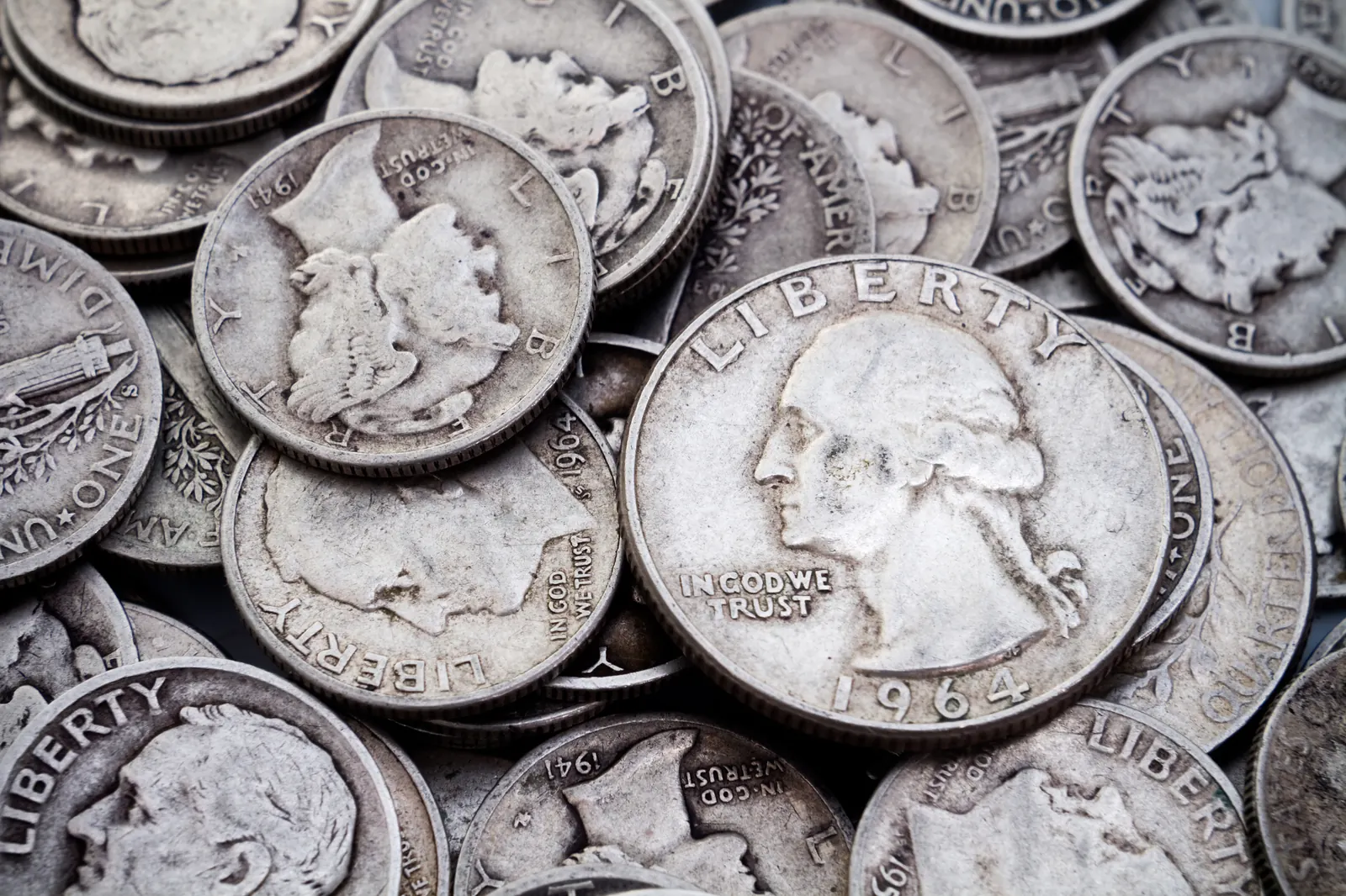 Pile of pre-1965 US 90% junk silver coins